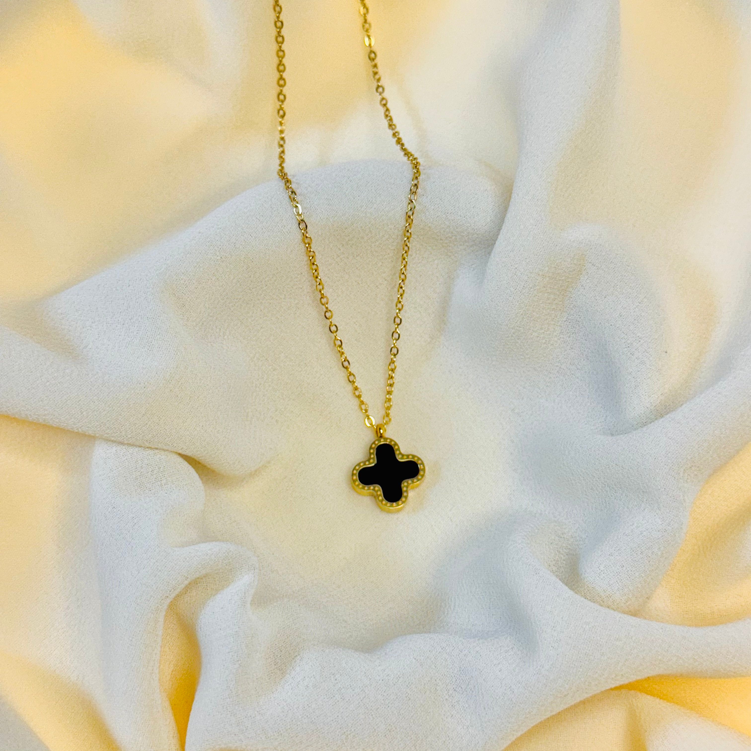 Elegant Golden Clover Necklace with Black Inlay