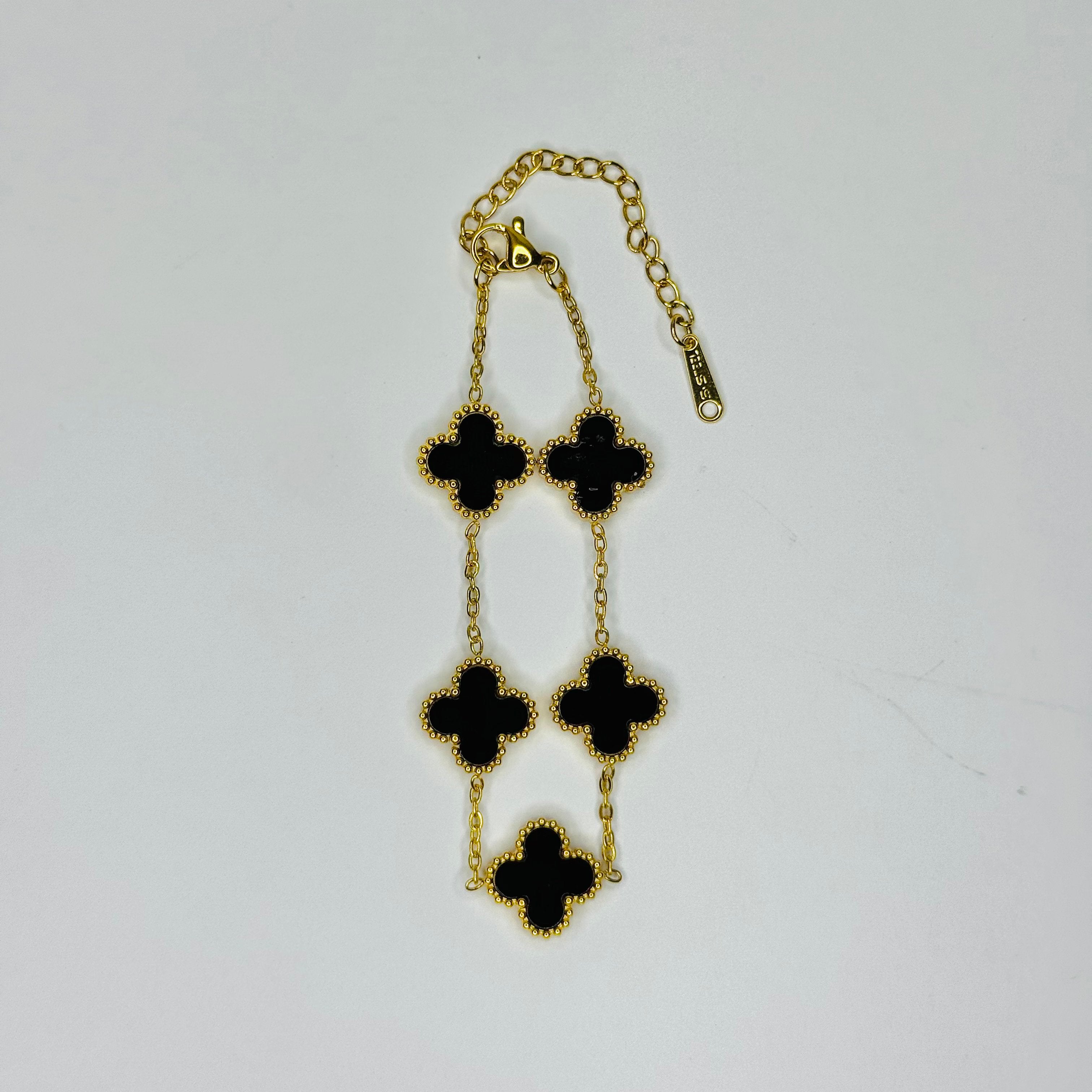 Elegant Black and Gold Clover Bracelet